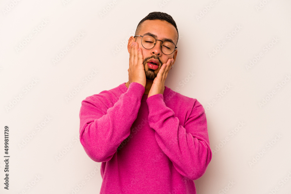 Young hispanic man isolated on white background whining and crying disconsolately. Young hispanic man isolated on white background whining and crying disconsolately.