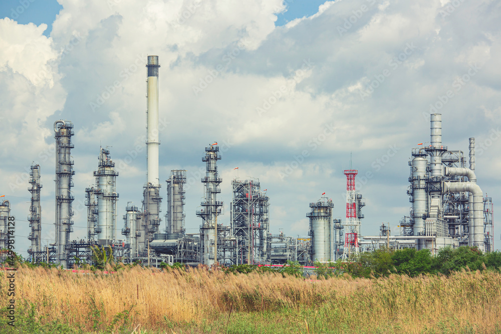 Scene afternoon of tank oil refinery plant tower and column tank oil of Petrochemistry industry blue sky Scene afternoon of tank oil refinery plant tower and column tank oil of Petrochemistry industry blue sky