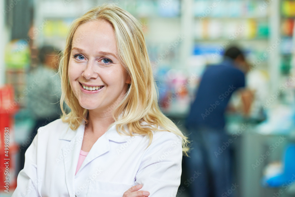 female pharmaceutical worker portrait in drugstore female pharmaceutical worker portrait in drugstore