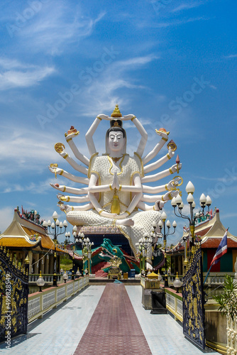 Statue of a god with many arms hands thailand koh samui temple shrine luxury travel tourist tourism religious © Warped Out