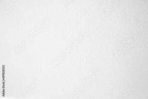 Felt white soft rough textile material background texture close up,poker table,tennis ball,table cloth. Empty white fabric background.
