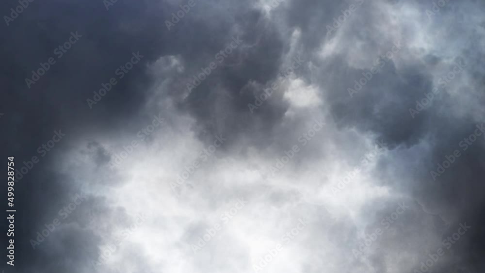 thunderstorm, Bright lightning's glow in a dark cloudy thunderstorm, Bright lightning's glow in a dark cloudy