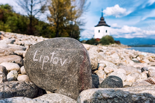 Text LIPTOV written on stone photo