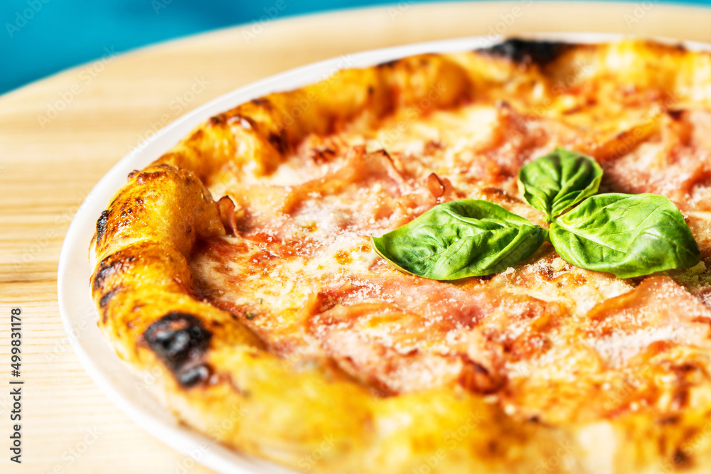 Hot tasty traditional italian pizza with ham. Hot tasty traditional italian pizza with ham.