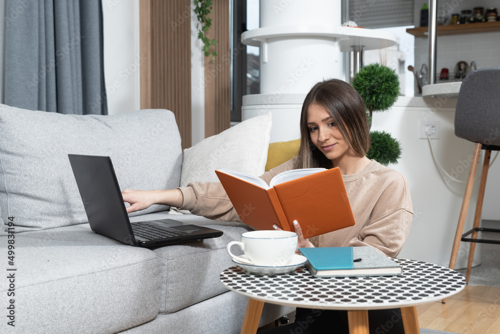 Young sick college student woman sitting at home and preparing for online class over the video conference call on her laptop computer. Online internet business education, health care concept. Young sick college student woman sitting at home and preparing for online class over the video conference call on her laptop computer. Online internet business education, health care concept.