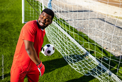 brazilian football player on stadium kicking ball for winning goal outdoors