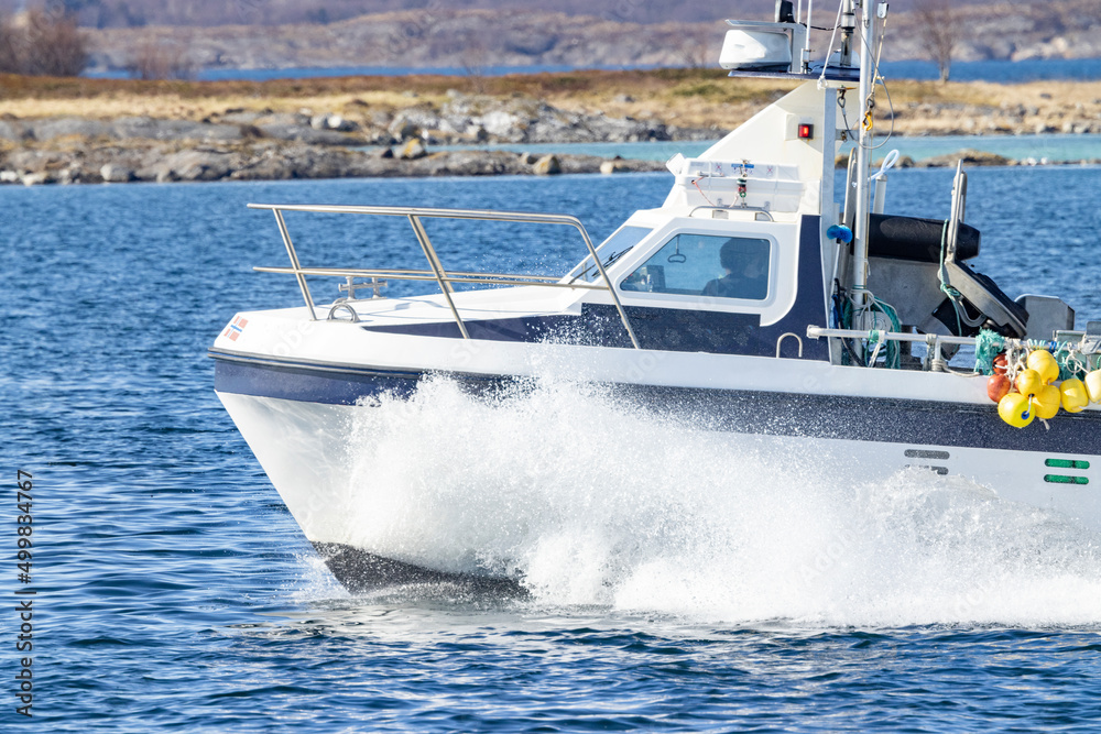 Fototapeta premium Motor boat in the sea,Northern Norway,scandinavia,Europe