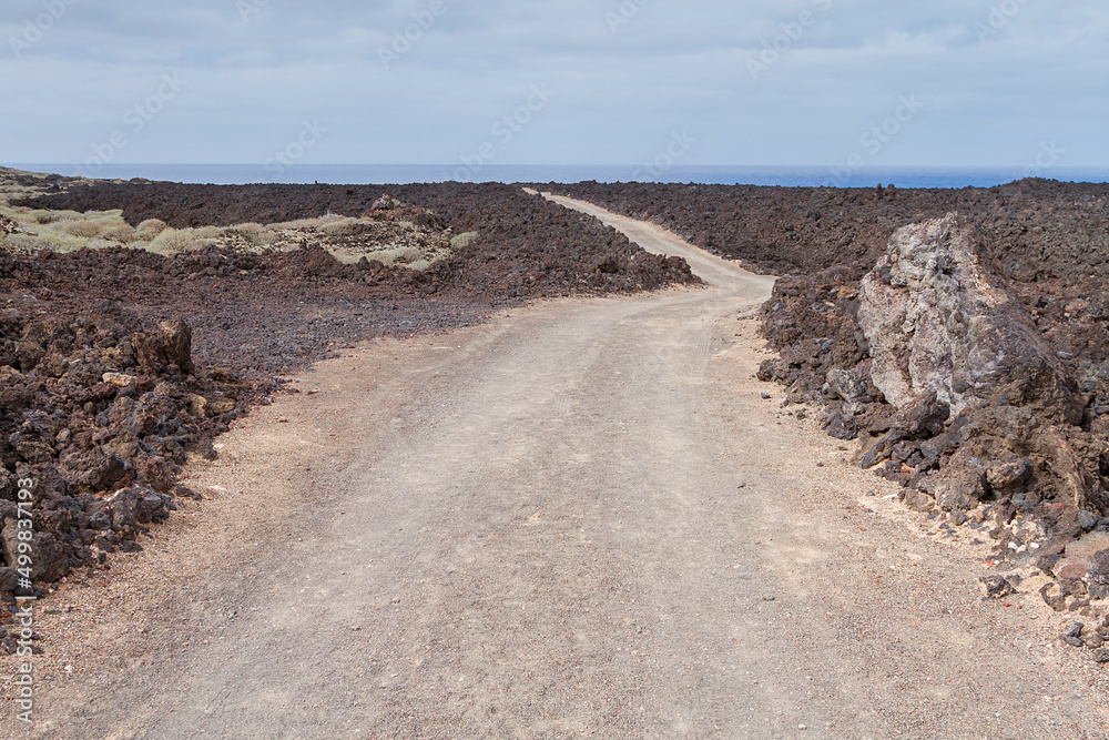 Landscape of a coastal path in the natural park of Timanfaya, Lanzarote