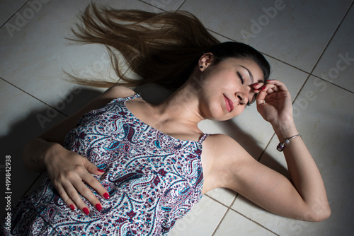 Girl lying with hair heart photo