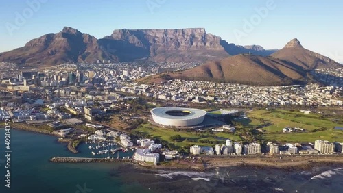 Aerial view over Cape Town, with Cape Town stadium and Table Mountain . photo