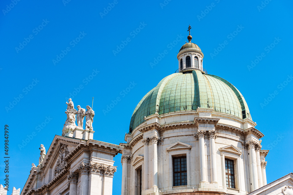 Close-up of the Cathedral of Santa Maria Assunta,1604-1825 in Brescia downtown, in late Baroque style, also called Duomo nuovo. Cathedral square or Paolo VI square. Lombardy, Italy, Europe.