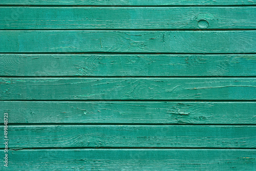 Industrial background - view of the wall of a old wooden railway wagon. Background of wooden boards close up