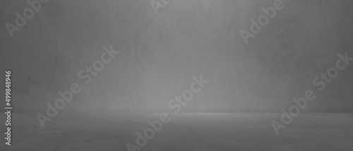 Fototapeta Naklejka Na Ścianę i Meble -  Empty dark grey wall room studio background with soft light and cent floor perspective well editing display product and text presentation on free space concrete backdrop