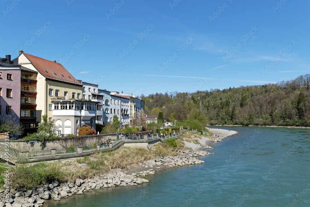 City view of Wasserburg am Inn. Colorful house facades on the banks of the Inn River.
