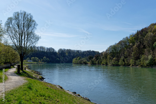 Hiking trail on flood embankment on the river Inn, along the old town of Wasserburg am Inn. photo