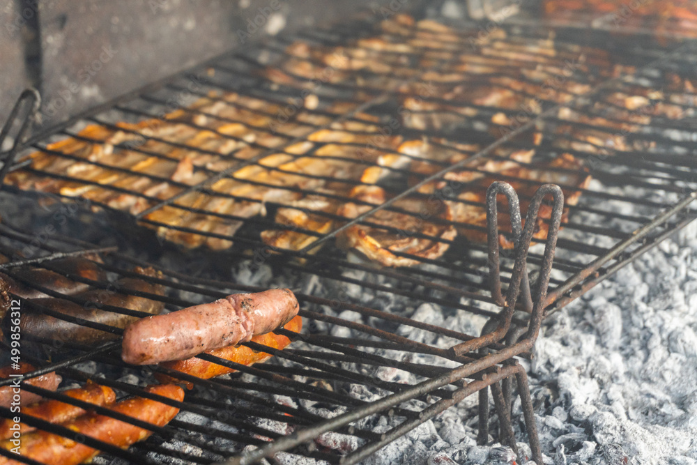 grilled sausages on the grill grilled sausages on the grill