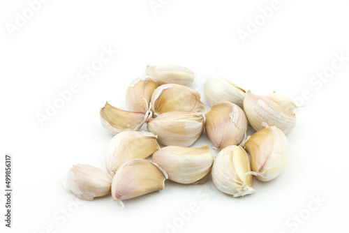 Closeup of a group lobe garlic (Allium sativum)cloves vegetable Isolated on white background, spiciness aromatic herb