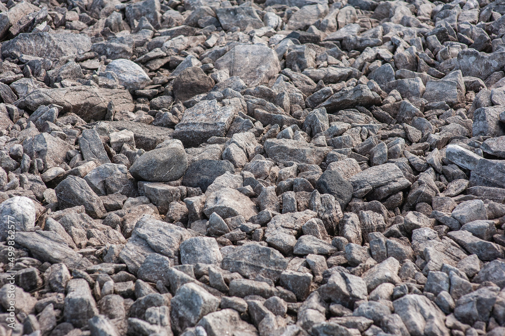 Grey different sizes stones texture background Grey different sizes stones texture background