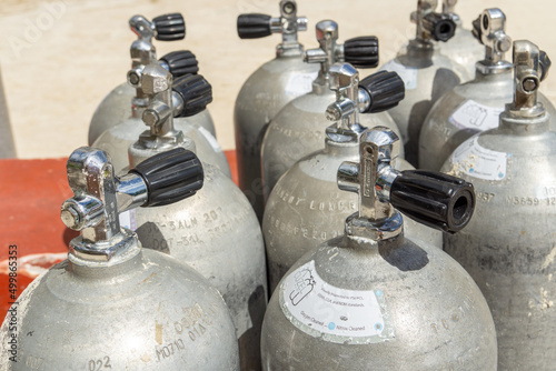 Diving oxygen tanks with air valves. Storage of aluminum cylinders. Oxygen cleaned.