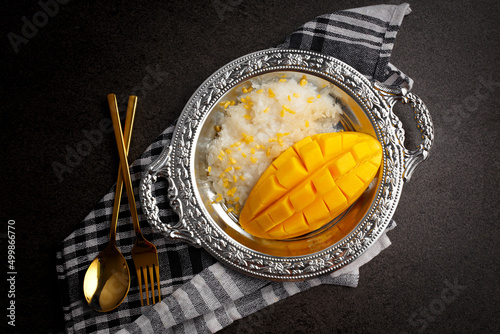 Mango sticky rice (Kwao Neaw Ma-Moung), popular Thai tradition dessert dish photo