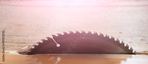 Foto Saw blade, sharp, rotating, high speed and dangerous.