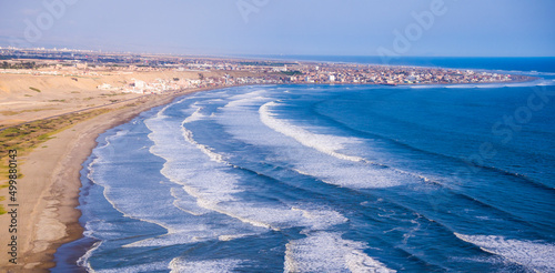 Trujillo, Peru: Aerial view of the coast and the plantation of reeds that are used for the manufacture of Caballitos de totora, small traditional boats from the north of Peru photo