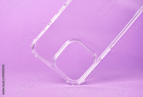 Close-up of a transparent silicone case for a smartphone on a very peri background.