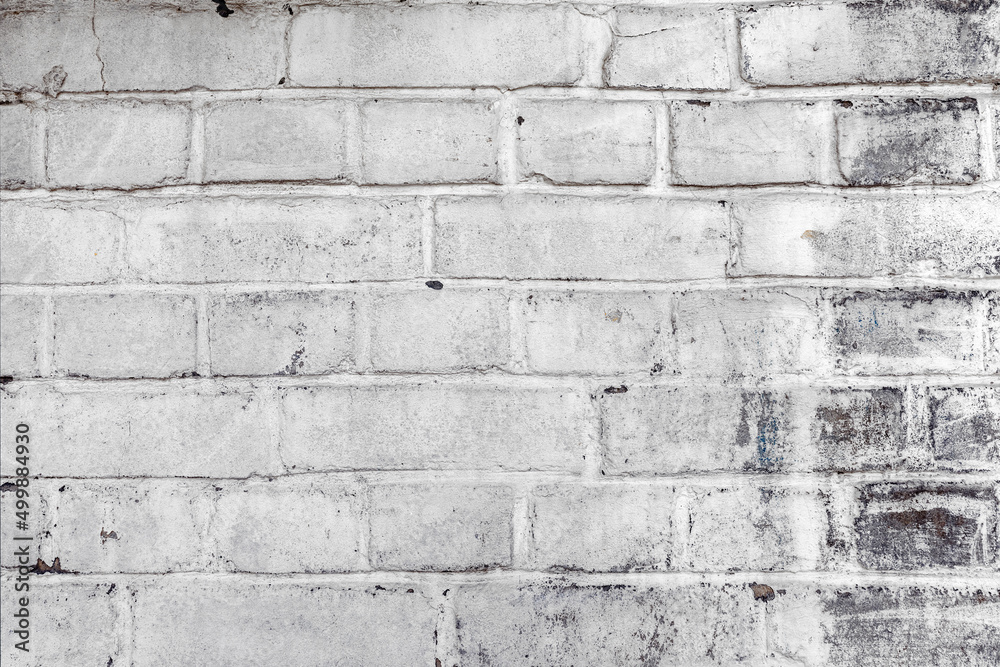 Fototapeta premium detail of historic brick wall in white as harmonic background