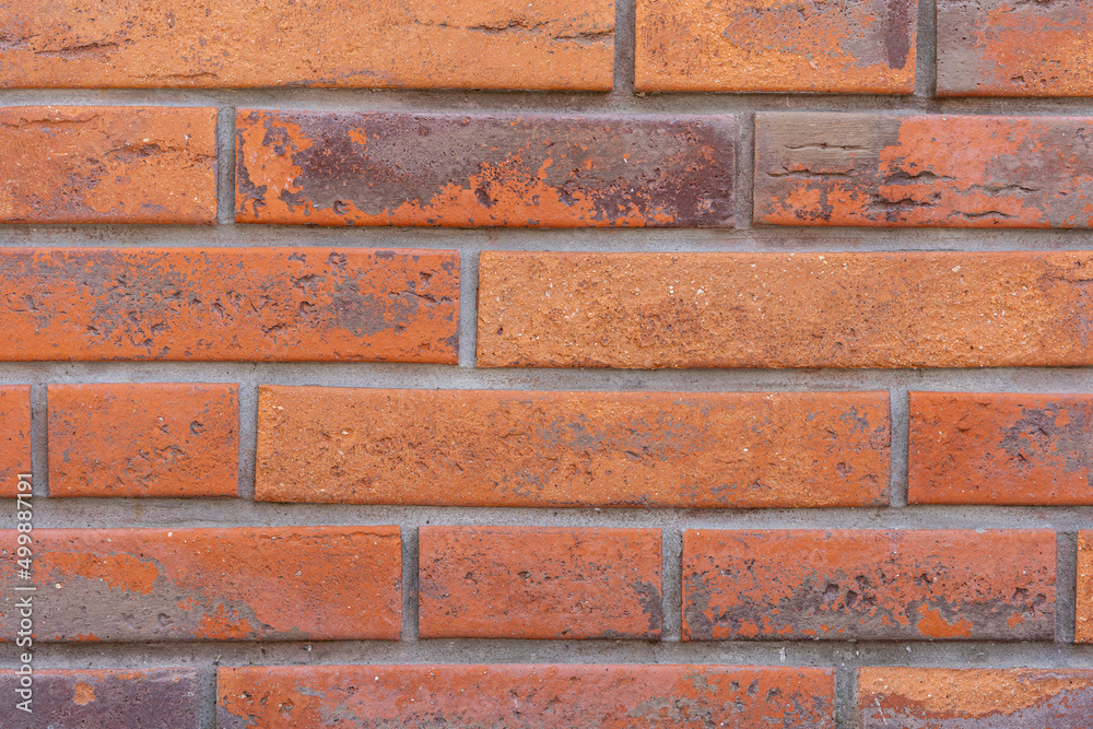 Fototapeta premium Background of orange red brick wall texture