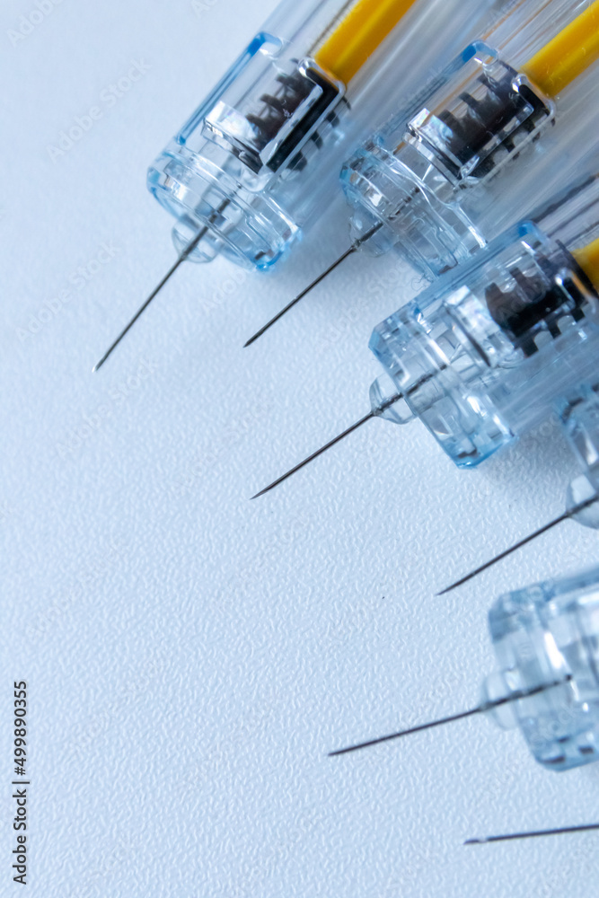 New medical vaccines ready for injection with syringe and vaccine to