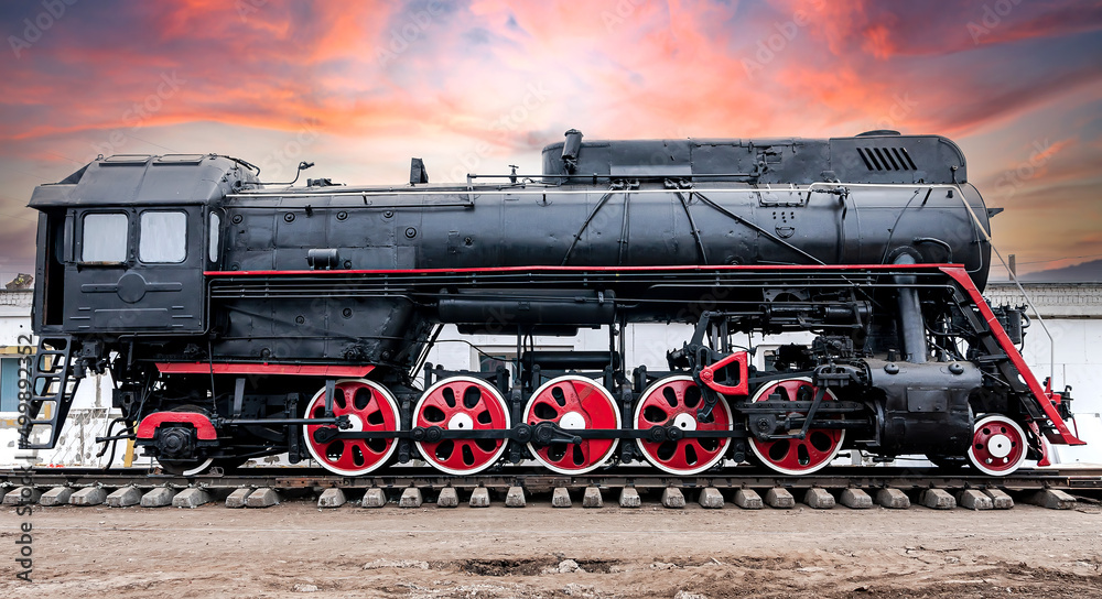 Retro soviet steam locomotive against the sky