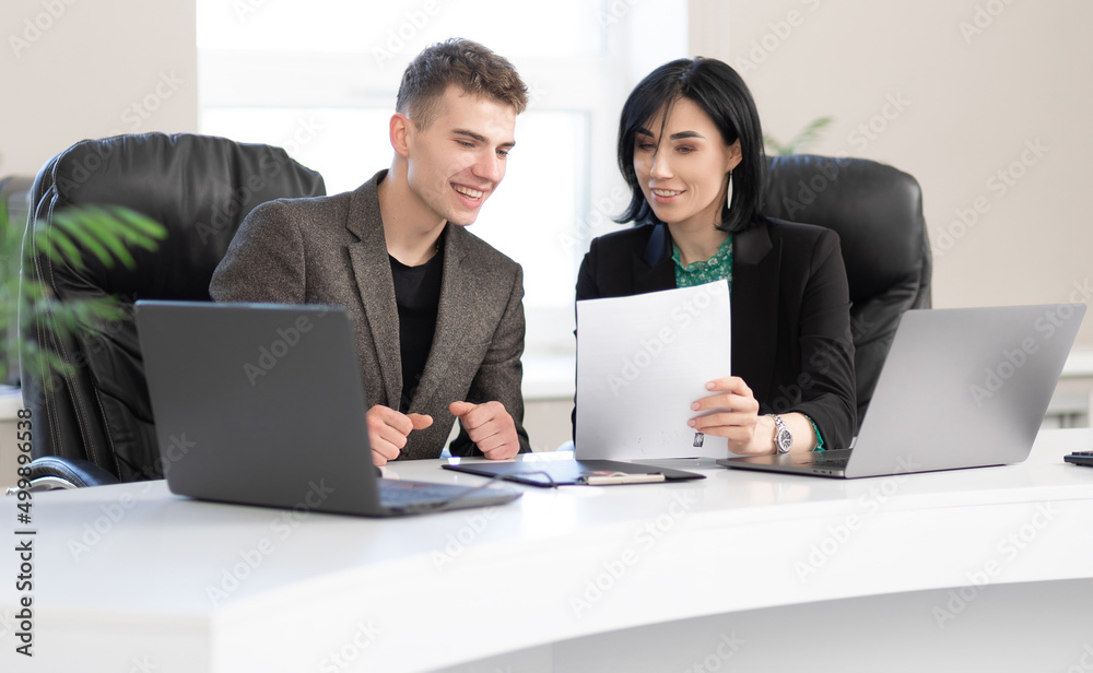 Businessman and businesswoman meeting In modern office Businessman and businesswoman meeting In modern office