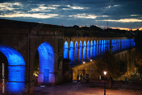 Night landscape of a long a aqueduct in Montpellier