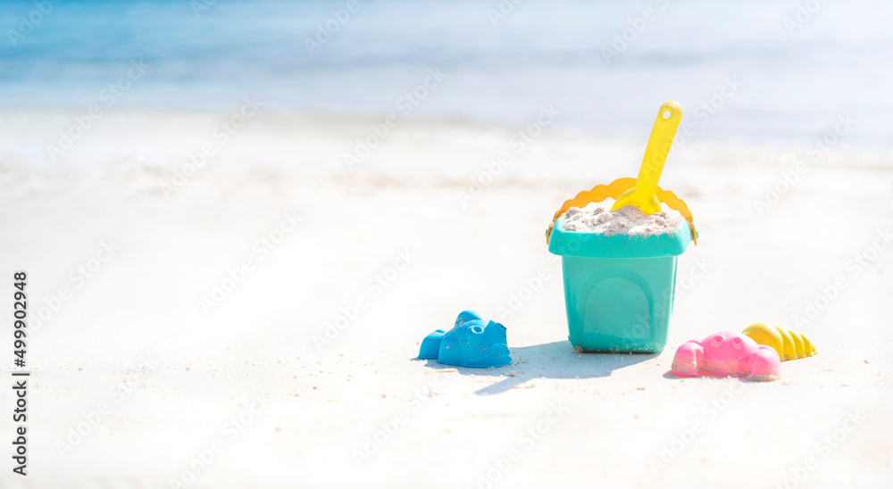 Children's beach toys on the background of the beach in the Maldives Children's beach toys on the background of the beach in the Maldives