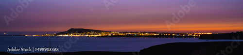 Panoramic view of the island of Fuerteventura from Papagayo beach (Lanzarote, Spain) at sunset