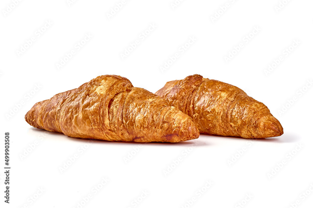 Freshly baked croissants, isolated on white background. Freshly baked croissants, isolated on white background.