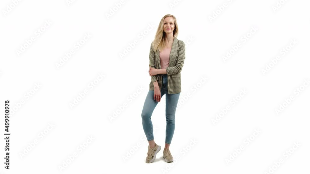 young beautiful blonde woman posing in front of camera full shot studio shot infinity white copy space lifestyle concept. High quality 4k footage young beautiful blonde woman posing in front of camera full shot studio shot infinity white copy space lifestyle concept. High quality 4k footage
