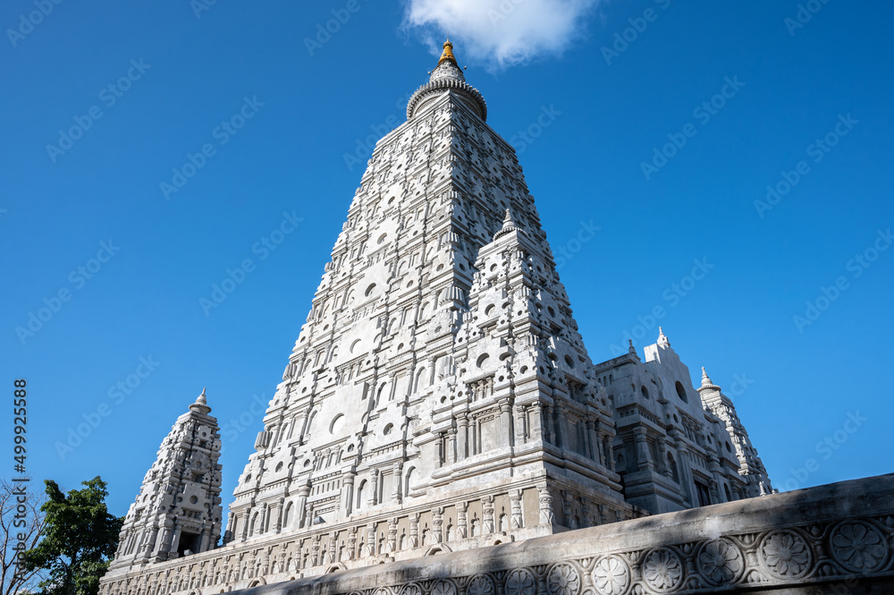 The large mock-up of Mahabodhi pagoda from Bodhgaya India building in Wat Chong Kham temple in Ngao district of Lampang province of Thailand.