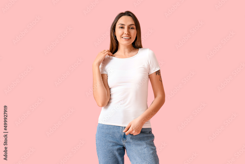 Young woman in blank t-shirt on color background Young woman in blank t-shirt on color background