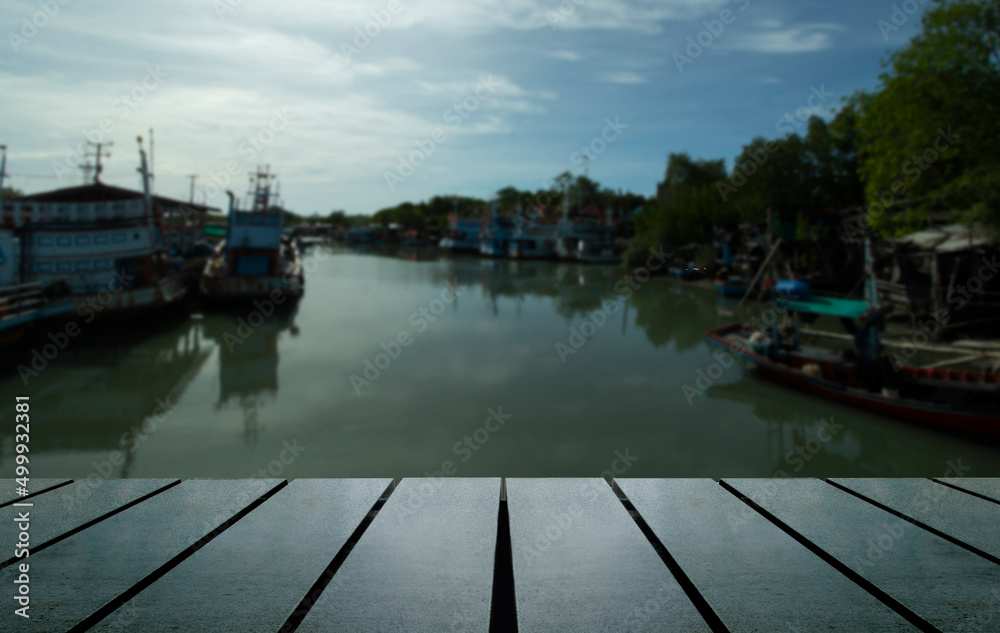Naklejka premium Table background of free space for standing product against the background of the autumn sea landscape Blue sky and clouds.Space concept for text and decoration, advertisement.