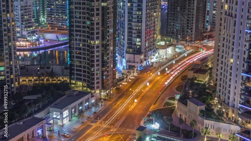 Wallpaper Mural Aerial view on Dubai Marina skyscrapers and the most luxury yacht in harbor night timelapse, Dubai, United Arab Emirates Torontodigital.ca