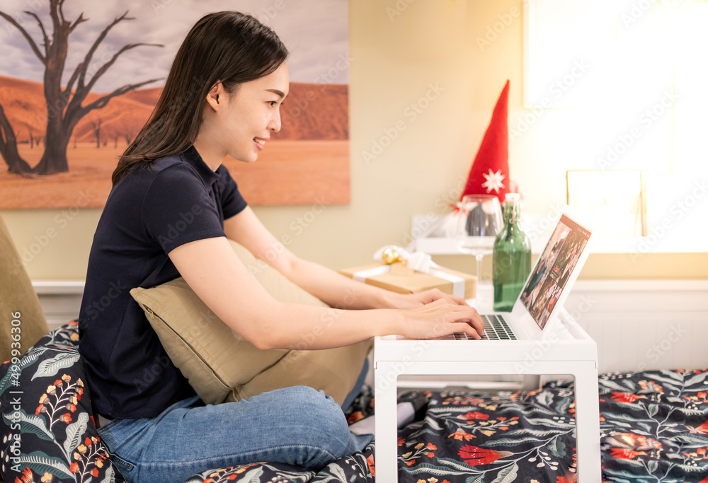 The businesswoman sit at workplace desk looks at pc screen during group videocall with different age and ethnicity colleagues using application and webcam, The businesswoman sit at workplace desk looks at pc screen during group videocall with different age and ethnicity colleagues using application and webcam,