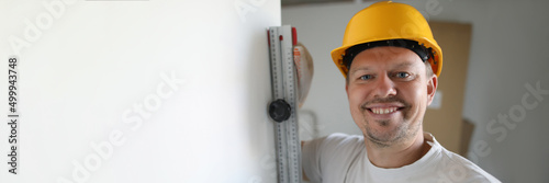 Smiling happy handyman at work