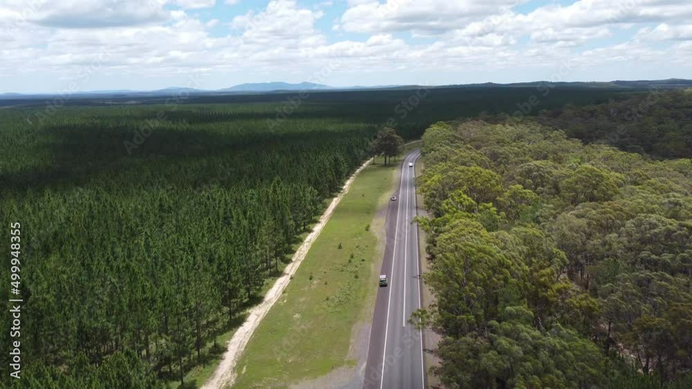 Flying over highway and showing two different vegetation on each side Flying over highway and showing two different vegetation on each side
