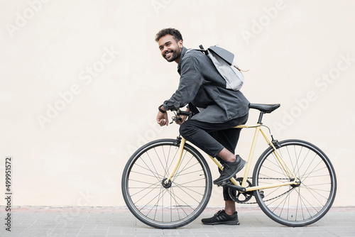 Fototapeta Handsome young man with bicycle in city, Smiling student men outdoor portrait, A