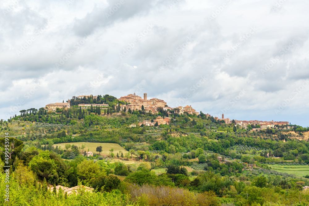 View of the village of Montepulciano on a hill in the Italian countryside