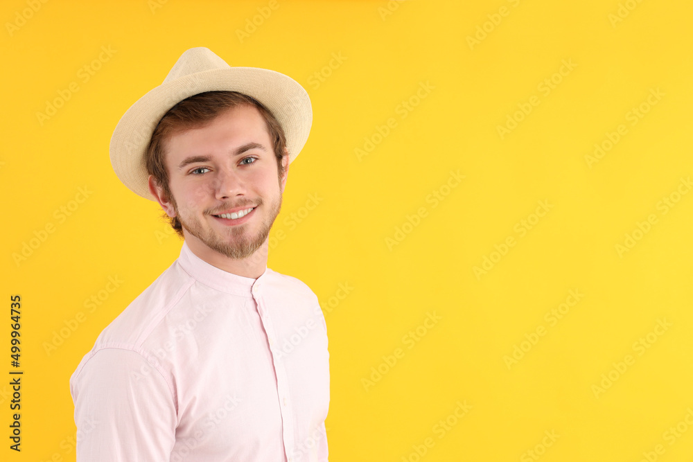 Concept of people with young man on yellow background Concept of people with young man on yellow background