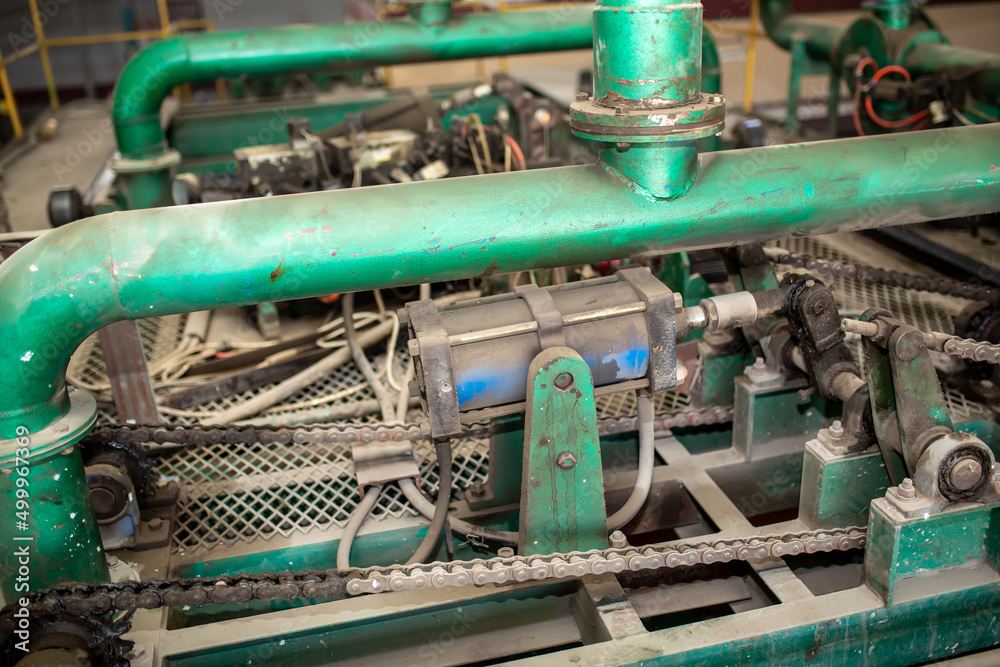 Slate factory, manufacturing technology.Modern equipment and machine tool automation. Technological works for the production of slate. Factory working atmosphere. Slate factory, manufacturing technology.Modern equipment and machine tool automation. Technological works for the production of slate. Factory working atmosphere.