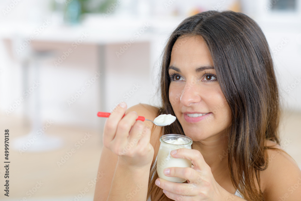 a woman is with yoghurt a woman is with yoghurt