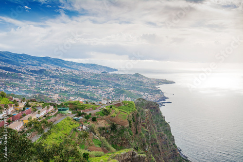 City in the marina. Madeira scenic mountain and ocean view.